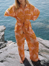 Pantalones sueltos con estampado festivo étnico único